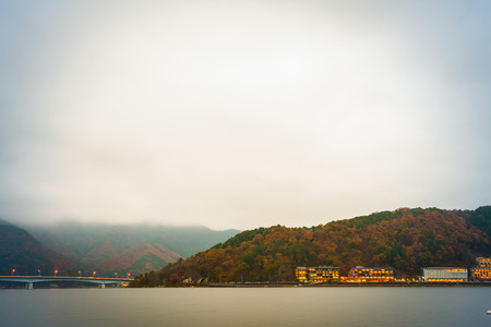 YAMANASHI, JAPAN - NOVEMBER 22: Kawaguchiko in Yamanashi, Japan on November 22, 2015. Hotels and resorts are surrounded lake kawaguchi ,Yamanashi Prefecture, Japanのeditorial素材