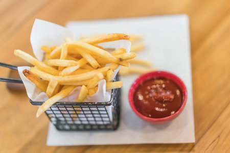 French fries on wood table