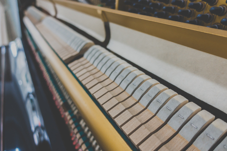 Close up of Inside the piano with selective focus Close up of Inside the piano ,Filtered image processed vintage effect.の写真素材
