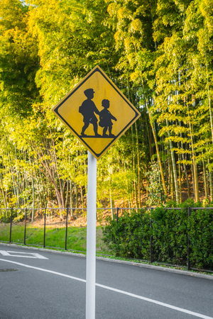 Road sign - Watch out for children.の写真素材
