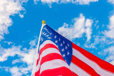 American flag on blue skyの写真素材