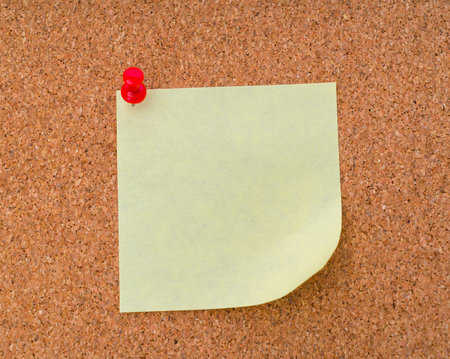 Post it notes on cork boardの写真素材