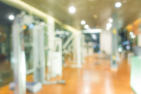 Abstract blur Fitness center with traineger equipmentsの写真素材