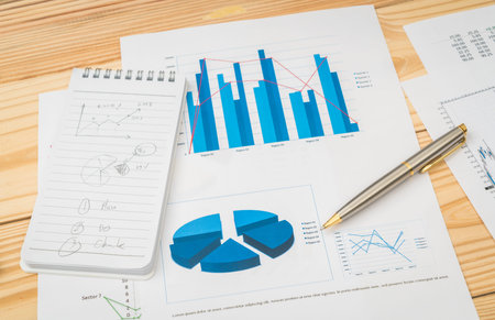 Financial charts on the tableの写真素材