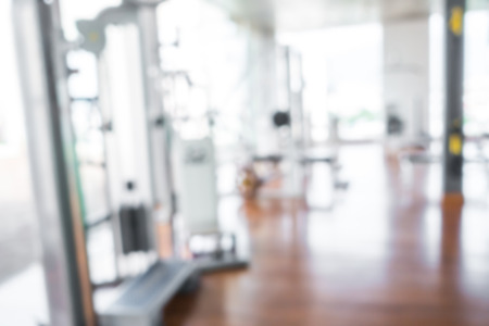 Abstract blur Fitness center with traineger equipmentsの写真素材