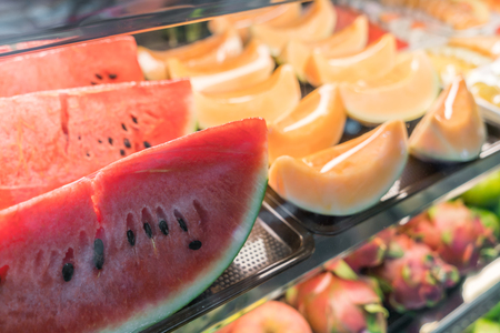 Water melon slices on bar in restaurantの写真素材