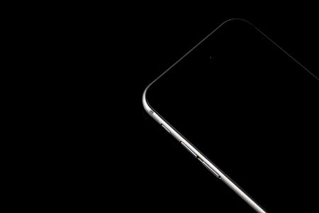 Mobile phone on black backgroundの写真素材