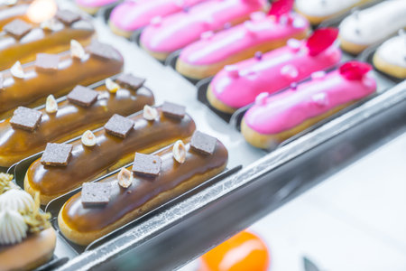 Brightly colored cakes  in refrigerator