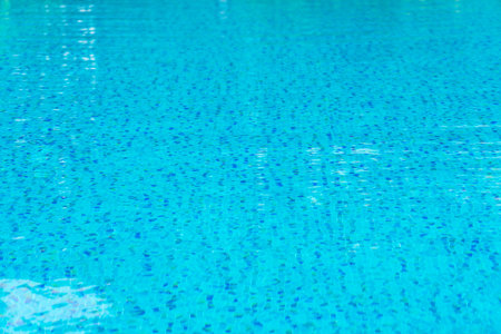 Blue swimming pool rippled water