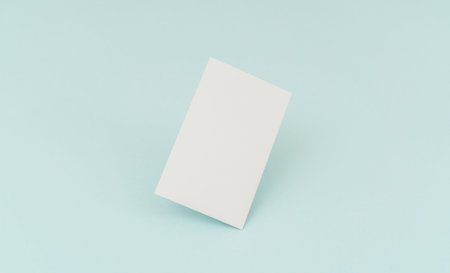 Blank business card on blue background