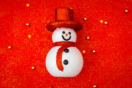 Red christmas background with Snowmanの写真素材