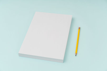 Blank flyer poster, brochure mockup,A4, US-Letter, with pencil  on blue backgroundの写真素材