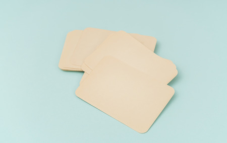 Blank vintage business card on blue backgroundの写真素材