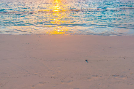 Beautiful sunset with sky over calm sea  in tropical Maldives island
