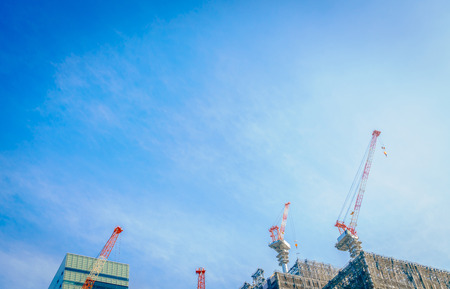 Crane and building construction siteの写真素材