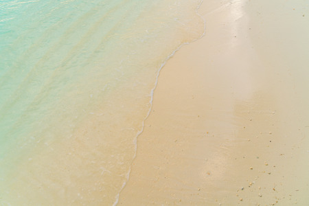 Beautiful tropical Maldives island with white sandy beach and seaの写真素材