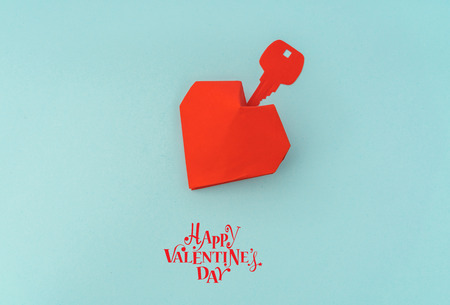 Paper cut of Key for heart as a symbol of loveの写真素材
