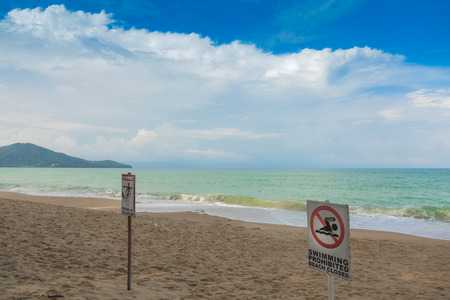 No swimming sign on  beachの写真素材
