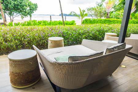 Tables and chairs in restaurantの写真素材