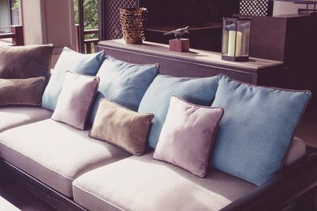 Closeup of modern furniture with pillows ( Filtered image processed vintage effect. )の写真素材