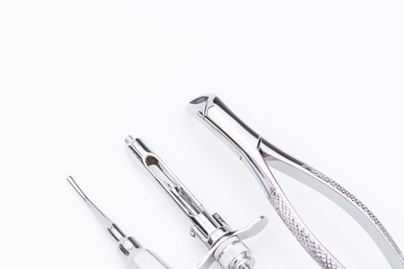 Dental tools and equipment on white background.の写真素材
