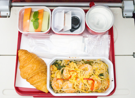 Healthy food on the plane with coffeeの写真素材