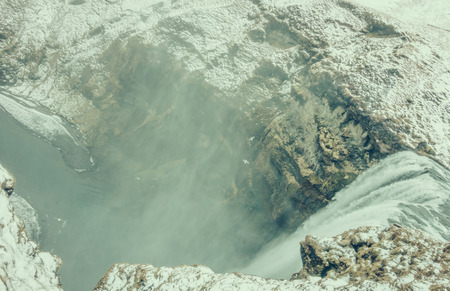Beautiful famous waterfall in Iceland,winter season ( Filtered image processed vintage effect. )の写真素材