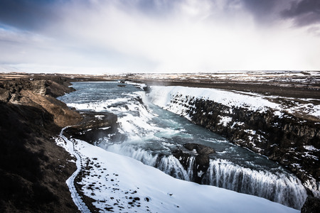 Beautiful famous waterfall in Iceland,winter season ( Filtered image processed vintage effect. )の写真素材