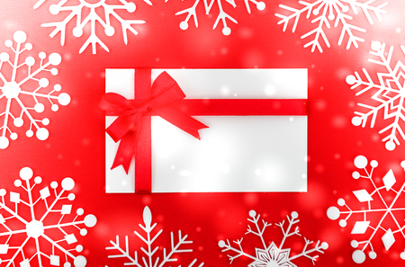 Vintage Christmas postcard with true paper snowflakesの写真素材
