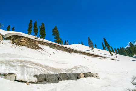 Beautiful  River and snow covered mountains landscape Kashmir state, Indiaの写真素材