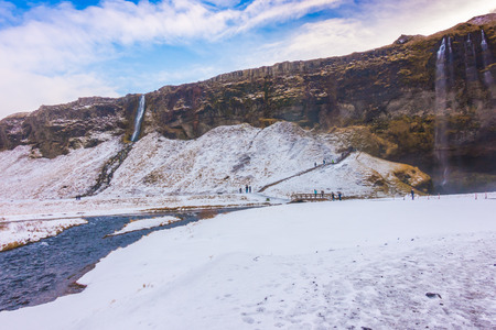 Beautiful famous waterfall in Iceland,winter seasonの写真素材