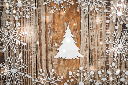 Paper snowflakes on woodenの写真素材