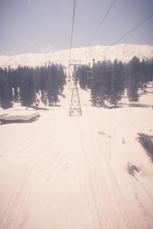 Cable car at snow mountain in Gulmark Kashmir, India ( Filtered image processed vintage effect. )の写真素材