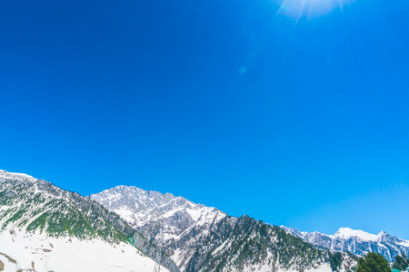 Beautiful  River and snow covered mountains landscape Kashmir state, Indiaの写真素材
