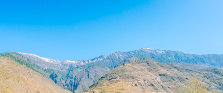 Beautiful  River and snow covered mountains landscape Kashmir state, Indiaの写真素材