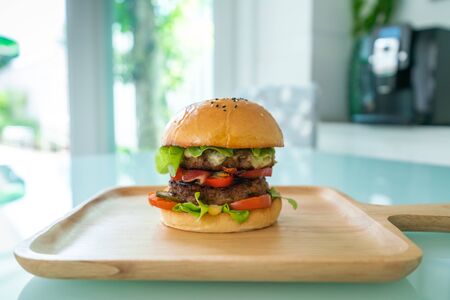 Homemade hamburger with fresh vegetables.の写真素材