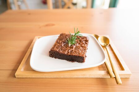 Chocolate brownies on wooden surface.の写真素材
