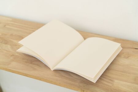 Blank catalog, magazines, book, mock up on wood background.の写真素材