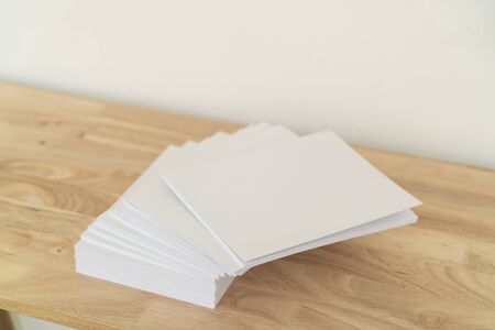Blank catalog, magazines, book, mock up on wood background.の写真素材