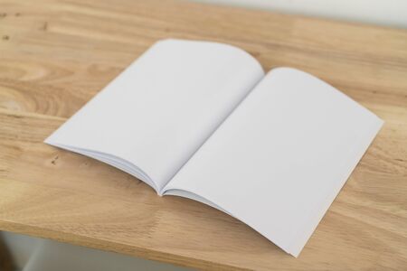 Blank catalog, magazines, book, mock up on wood background.の写真素材