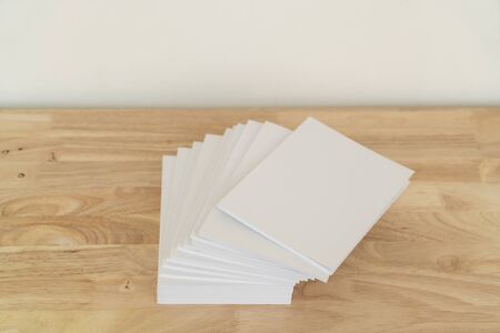 Blank catalog, magazines, book, mock up on wood background.の写真素材