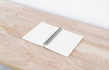 Blank catalog, magazines, book, mock up on wood background.の写真素材