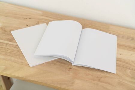Blank catalog, magazines, book, mock up on wood background.の写真素材