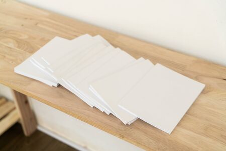 Blank catalog, magazines, book, mock up on wood background.の写真素材