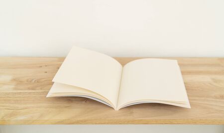 Blank catalog, magazines, book, mock up on wood background.の写真素材