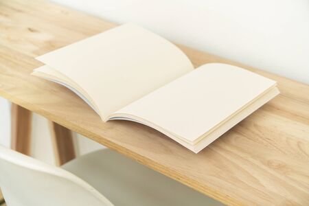 Blank catalog, magazines, book, mock up on wood background.の写真素材