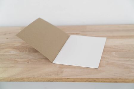 Blank catalog, magazines, book, mock up on wood background.の写真素材