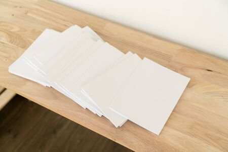 Blank catalog, magazines, book, mock up on wood background.の写真素材