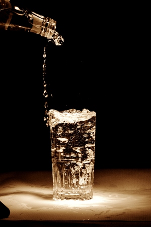 Pouring of mineral waterの写真素材