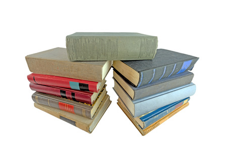 Stack of old books isolated on whiteの写真素材
